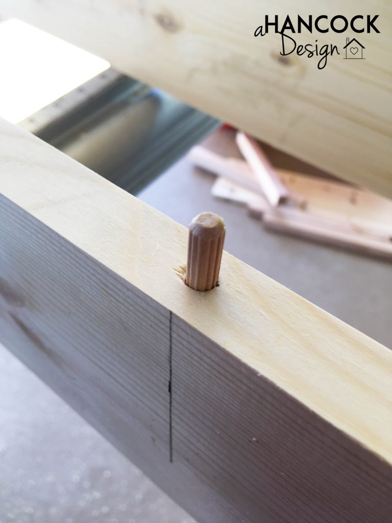 Dowel peg in holes of jointer