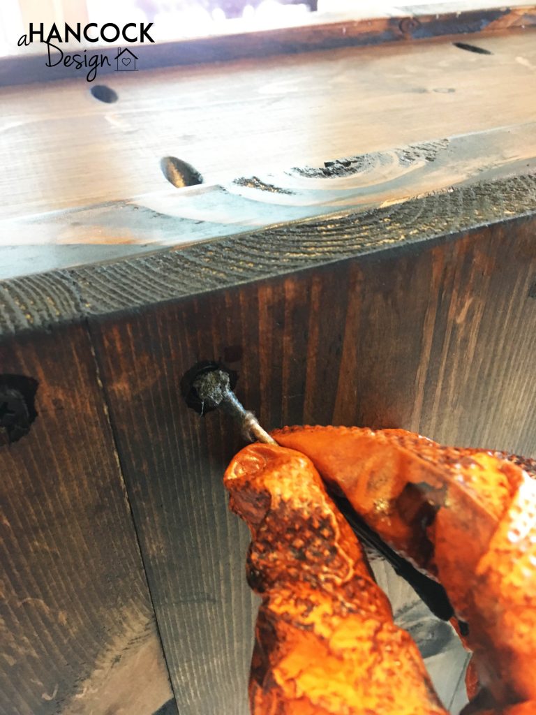 DIY custom footboard staining in holes with Q-Tip
