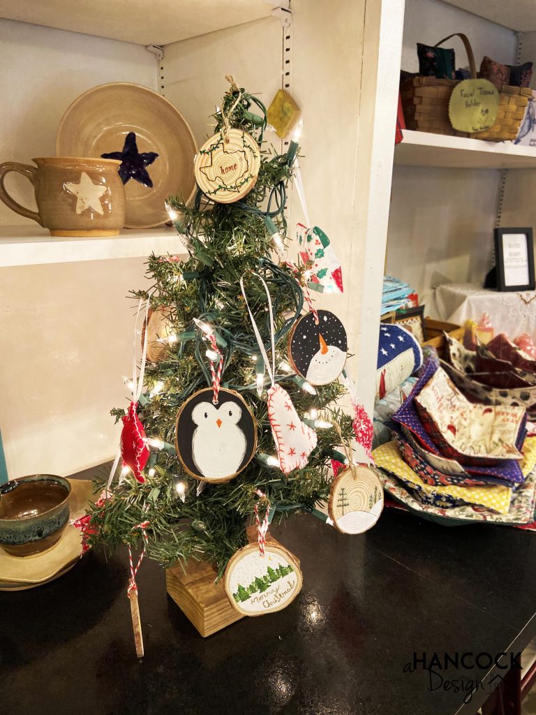 Wood Slice Ornaments hanging on tree