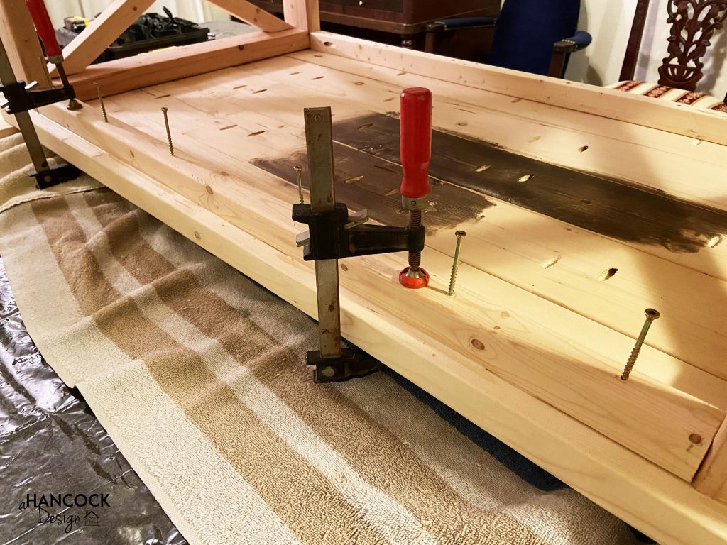 Attaching table top to base